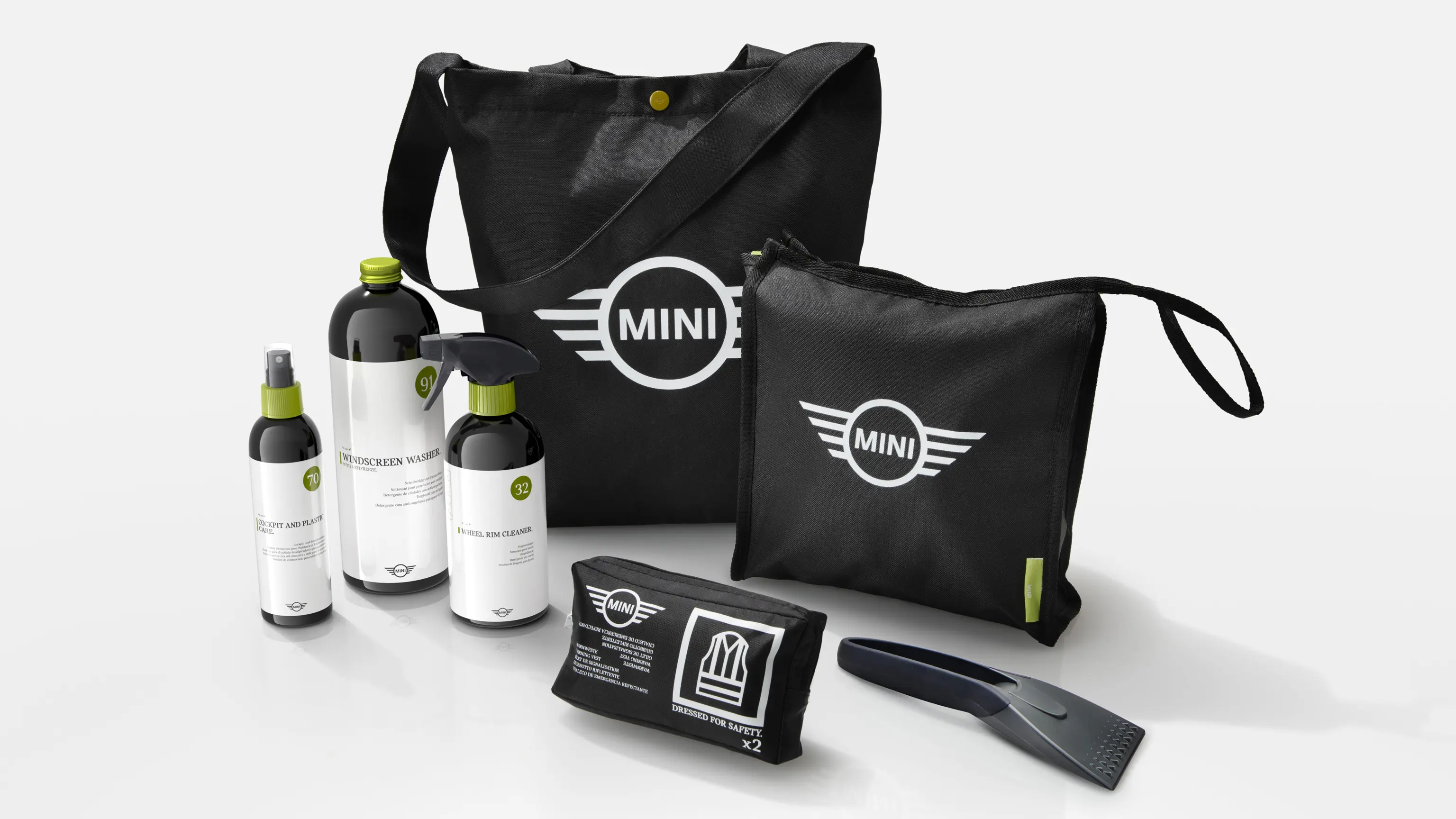 Produse de curăţare şi îngrijire MINI cu şampon auto, soluţie de curăţare a jantelor, lichid de parbriz, racletă pentru gheaţă şi genţi rezistente MINI