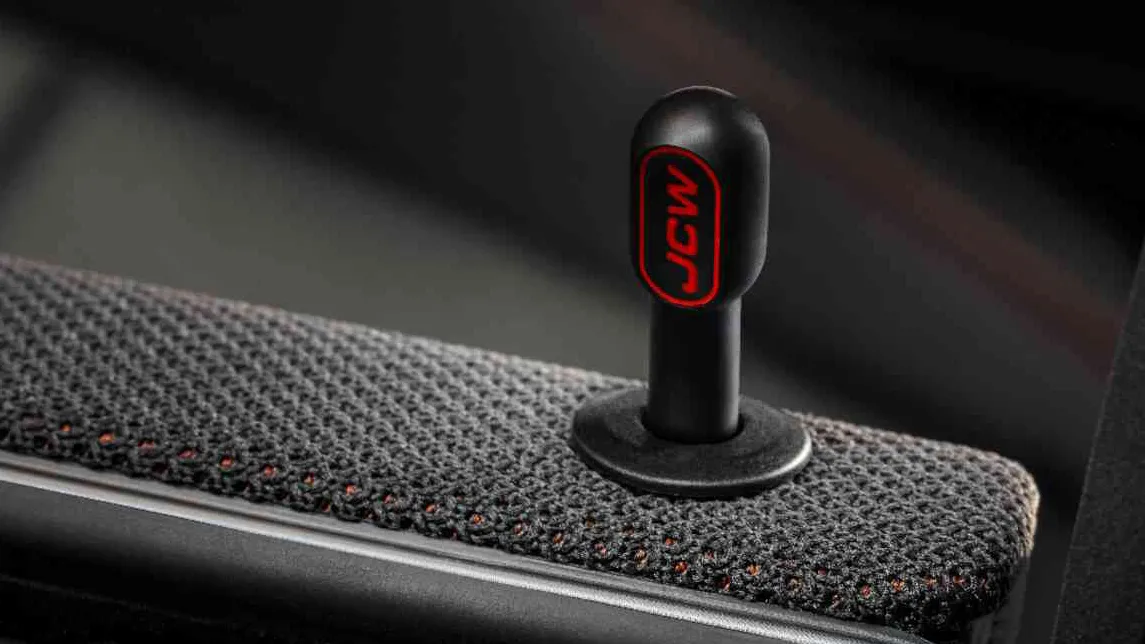 Buton blocare portieră MINI John Cooper Works cu design RED LINE. 