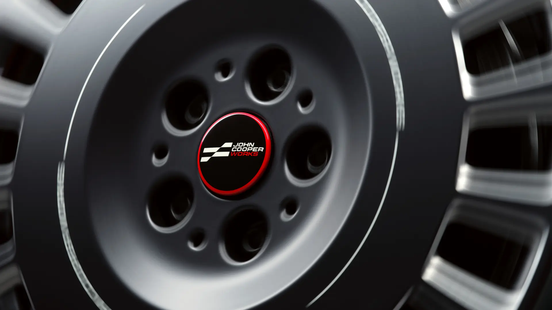 Capac central flotant John Cooper Works care nu se învârte odată cu roata, ci îşi păstrează poziţia orizontală în timpul deplasării. 